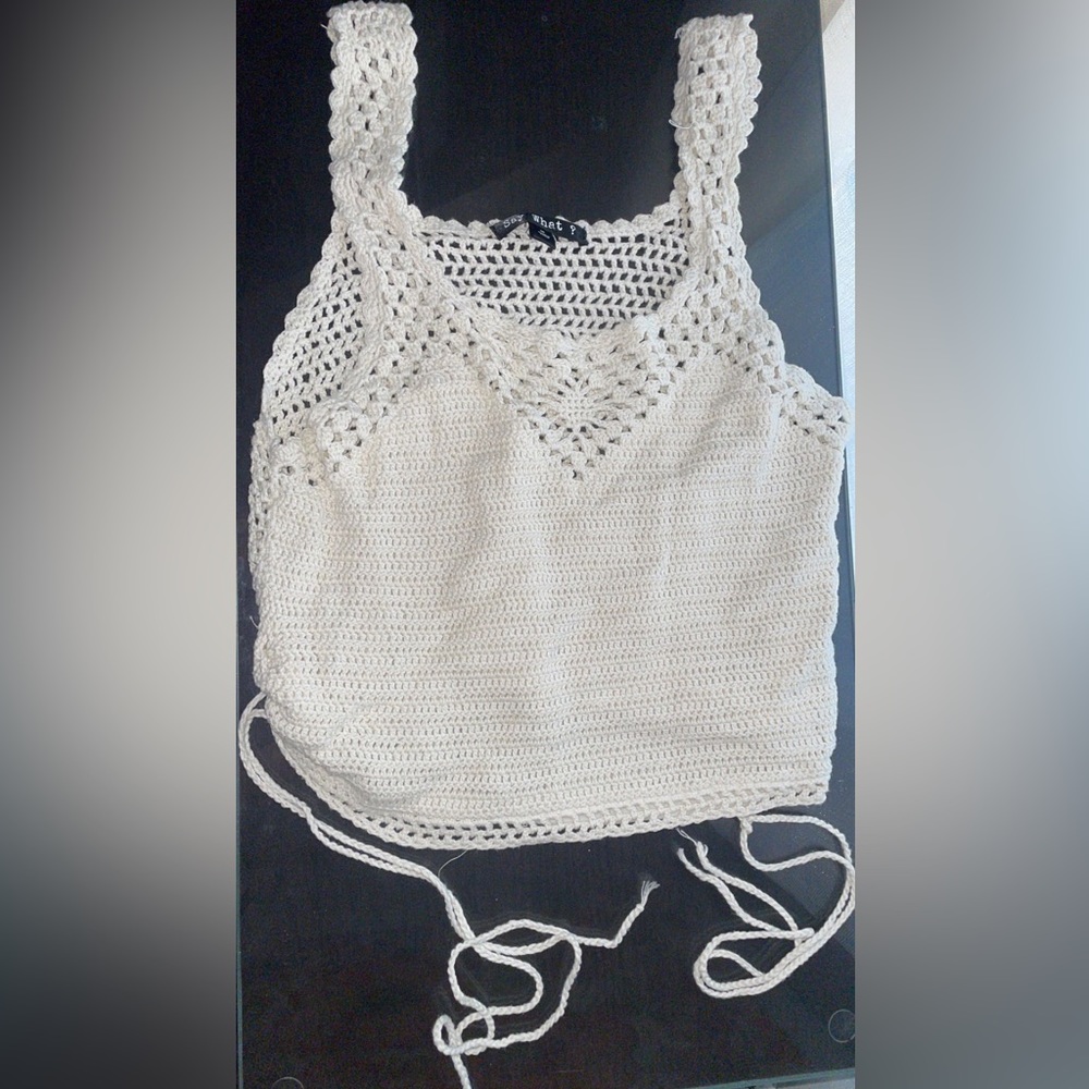 The brand is Say What? Women’s top size Medium!